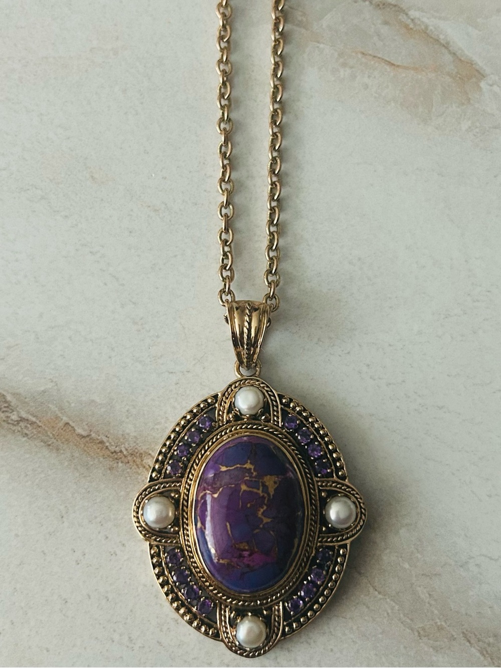 Gold Toned Oval Purple Cabochon Pendant Necklace with Sparkly Accents